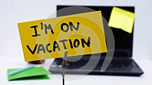 I am on vacation written