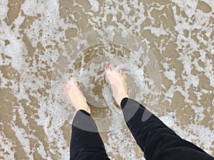 I`ve got my feet in the water, ass in the sand`