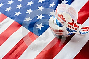 I vote today stickers roll, in US elections on American flag photo