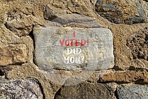 I voted. Did you symbol. Concept words I voted. Did you on beautiful big grey stone. Beautiful stone wall background. Business I