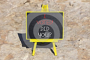 I voted. Did you symbol. Concept words I voted. Did you on beautiful black chalk blackboard. Beautiful stone background. Business