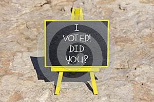 I voted. Did you symbol. Concept words I voted. Did you on beautiful black chalk blackboard. Beautiful stone background. Business