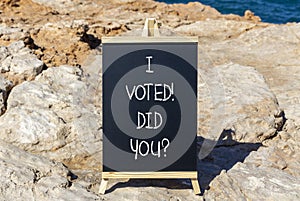 I voted. Did you symbol. Concept words I voted. Did you on beautiful black chalk blackboard. Beautiful stone blue sea sky