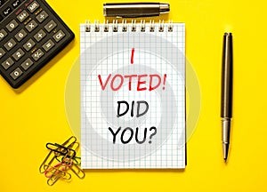 I voted. Did you symbol. Concept words I voted. Did you on beautiful white note. Beautiful yellow background. Calculator. Black