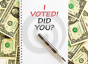 I voted. Did you symbol. Concept words I voted. Did you on beautiful white note. Black pen. Beautiful dollar bills background.