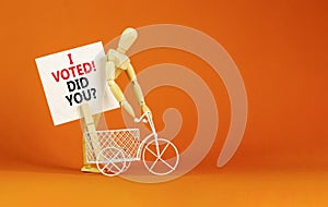 I voted. Did you symbol. Concept words I voted. Did you on beautiful white paper on clothespin. Bicycle model. Voter model.