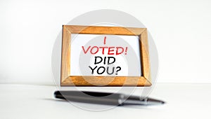 I voted. Did you symbol. Concept words I voted. Did you on beautiful white wooden frame. Black pen. Beautiful white background.