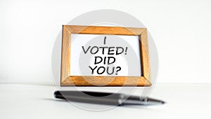 I voted. Did you symbol. Concept words I voted. Did you on beautiful white wooden frame. Black pen. Beautiful white background.