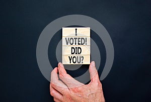 I voted. Did you symbol. Concept words I voted. Did you on beautiful wooden block. Beautiful black table black background. Voter