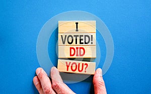 I voted. Did you symbol. Concept words I voted. Did you on beautiful wooden block. Beautiful blue table blue background. Voter