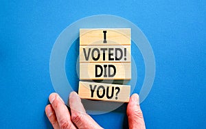 I voted. Did you symbol. Concept words I voted. Did you on beautiful wooden block. Beautiful blue table blue background. Voter