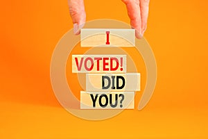 I voted. Did you symbol. Concept words I voted. Did you on beautiful wooden block. Beautiful orange table orange background. Voter