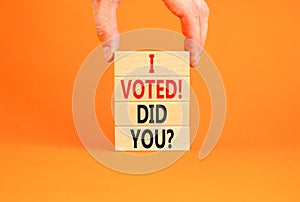 I voted. Did you symbol. Concept words I voted. Did you on beautiful wooden block. Beautiful orange table orange background. Voter
