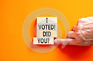 I voted. Did you symbol. Concept words I voted. Did you on beautiful wooden block. Beautiful orange table orange background. Voter