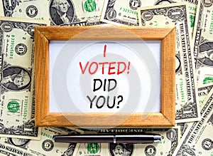 I voted. Did you symbol. Concept words I voted. Did you on beautiful wooden frame. Black pen. Beautiful dollar bills background.