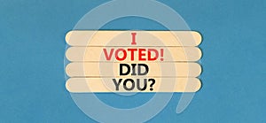 I voted. Did you symbol. Concept words I voted. Did you on wooden stick. Beautiful blue table blue background. Business I voted.