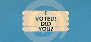 I voted. Did you symbol. Concept words I voted. Did you on wooden stick. Beautiful blue table blue background. Business I voted.