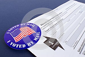 `I Voted By Mail` sticker and Absentee Voter Application Vote by Mail Form