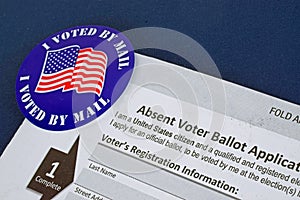 `I Voted By Mail` sticker and Absentee Voter Application Vote by Mail Form