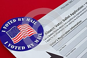 `I Voted By Mail` sticker and Absentee Voter Application Vote by Mail Form