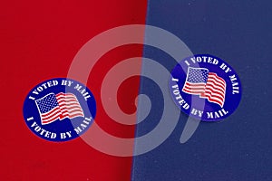 `I Voted By Mail` sticker on red and blue background