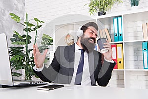 I want to break free. Office singer. Bearded man sing song at workplace. Businessman pretend singing in coffee cup