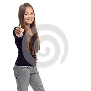 I want you to join in. Studio portrait of a confident teenage girl pointing to the camera against a white background.