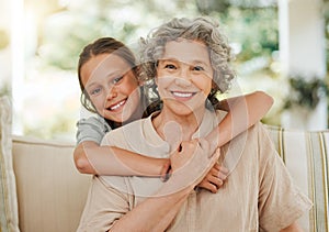 I always want your arms around me. a little girl hugging her grandmother.