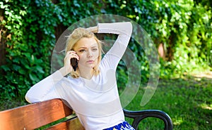I was worrying about you. Girl modern smartphone calling friend cell phone. Girl blonde tense face talk smartphone green