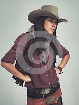 I wasnt lying...You just didnt ask the right question...an attractive young woman in cowboy attire.