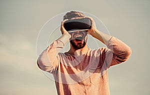 I am a winner. man sky background vr glasses. create own business. Play virtual game. male reality in digital world. Use