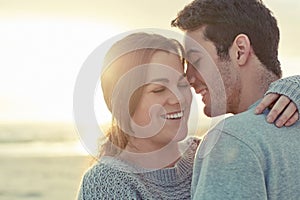 I wish this moment would never end. Portrait of a happy young couple bonding outside.