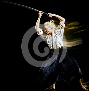 Iaido Kenjutsu bodoka woman isolated black background