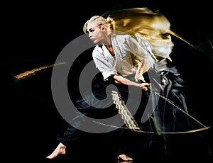 Iaido Kenjutsu budoka woman isolated black background