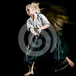 Iaido  Kenjutsu  budoka woman isolated black background