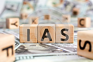 IAS - acronym from wooden blocks with letters