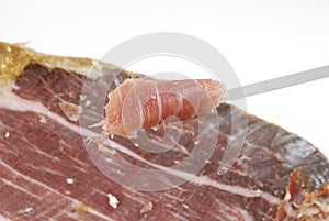 Iberian ham strips cut photo