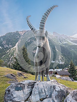 Ibex statue in Pralognan-la-Vanoise, close by national park of Vanoise photo