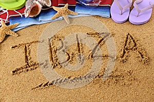 Ibiza beach holiday sand word writing