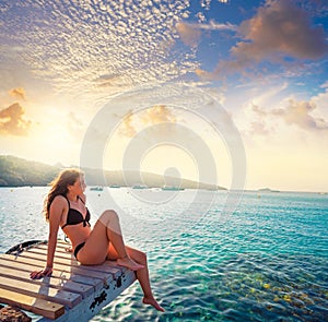 Ibiza bikini girl relaxed at Portinatx beach photo