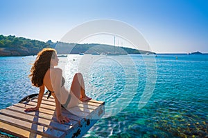 Ibiza bikini girl relaxed at Portinatx beach photo