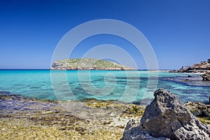 Ibiza - Cala Comte, view from Cala Escondida over the sea to the island.Illa des Bosc photo