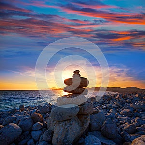 Ibiza Cap des Falco beach sunset with desire stones