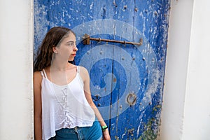 Ibiza Eivissa young girl on blue door photo