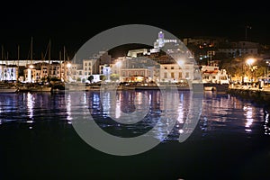 Ibiza island harbor and city under night light