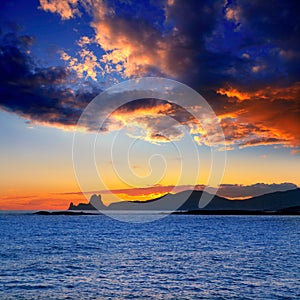 Ibiza island sunset with Es Vedra in background photo