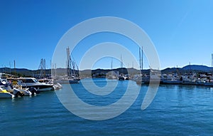 Ibiza, Port of San Antonio - October 16, 2019:boats at sea, mountains in the backround