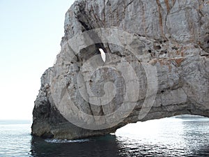 Ibiza rocks on the sea photo