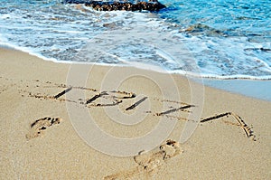 Ibiza written in the sand