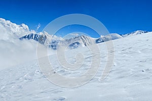 Ibn Sina Avicenna or Lenin peak at Pamir mountains cold snow ice glacier